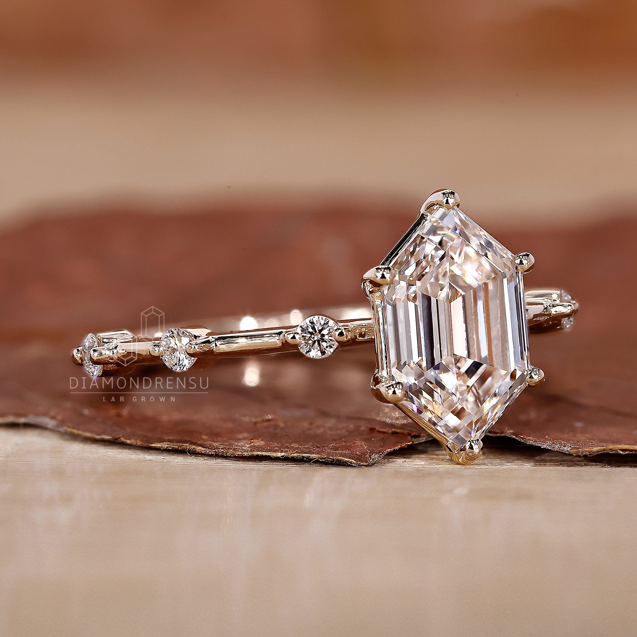 Yellow gold ring with distance pave diamond design.
