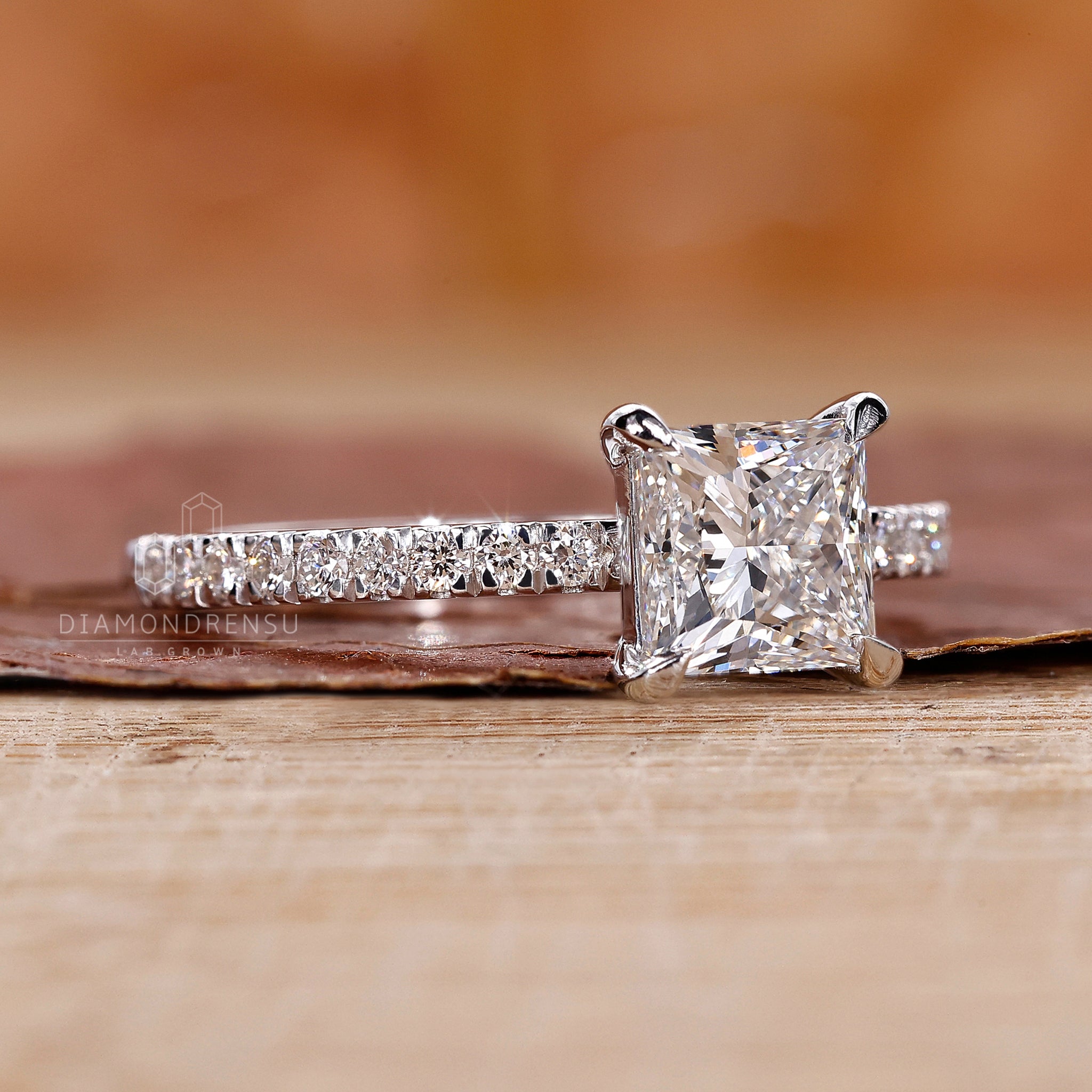 4 prong claw setting ring with princess cut diamond.
