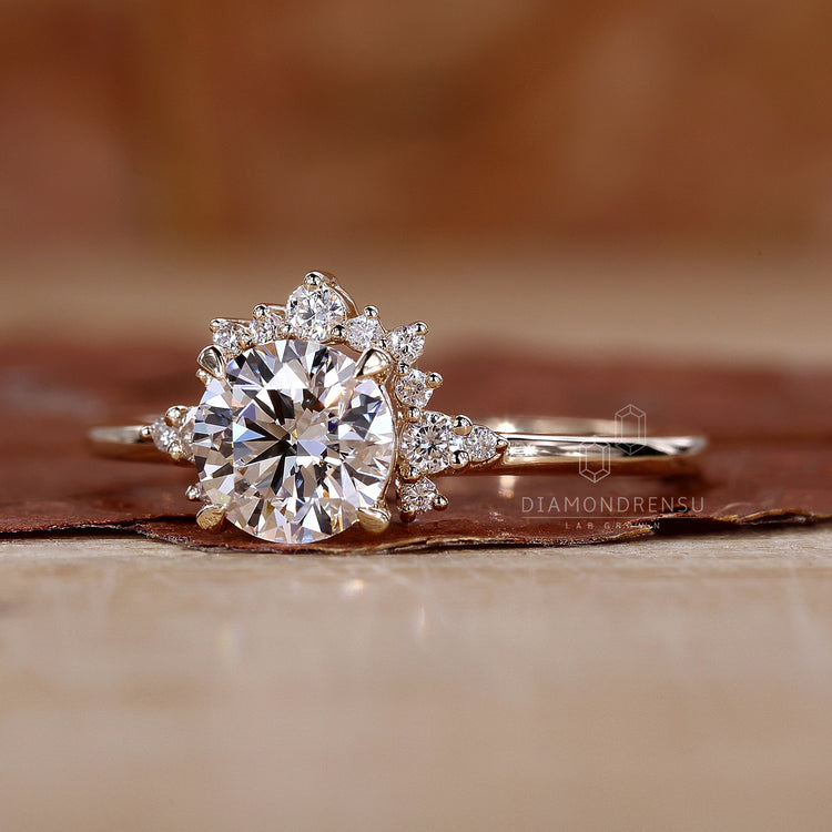 4 claw prong setting round halo engagement ring.
