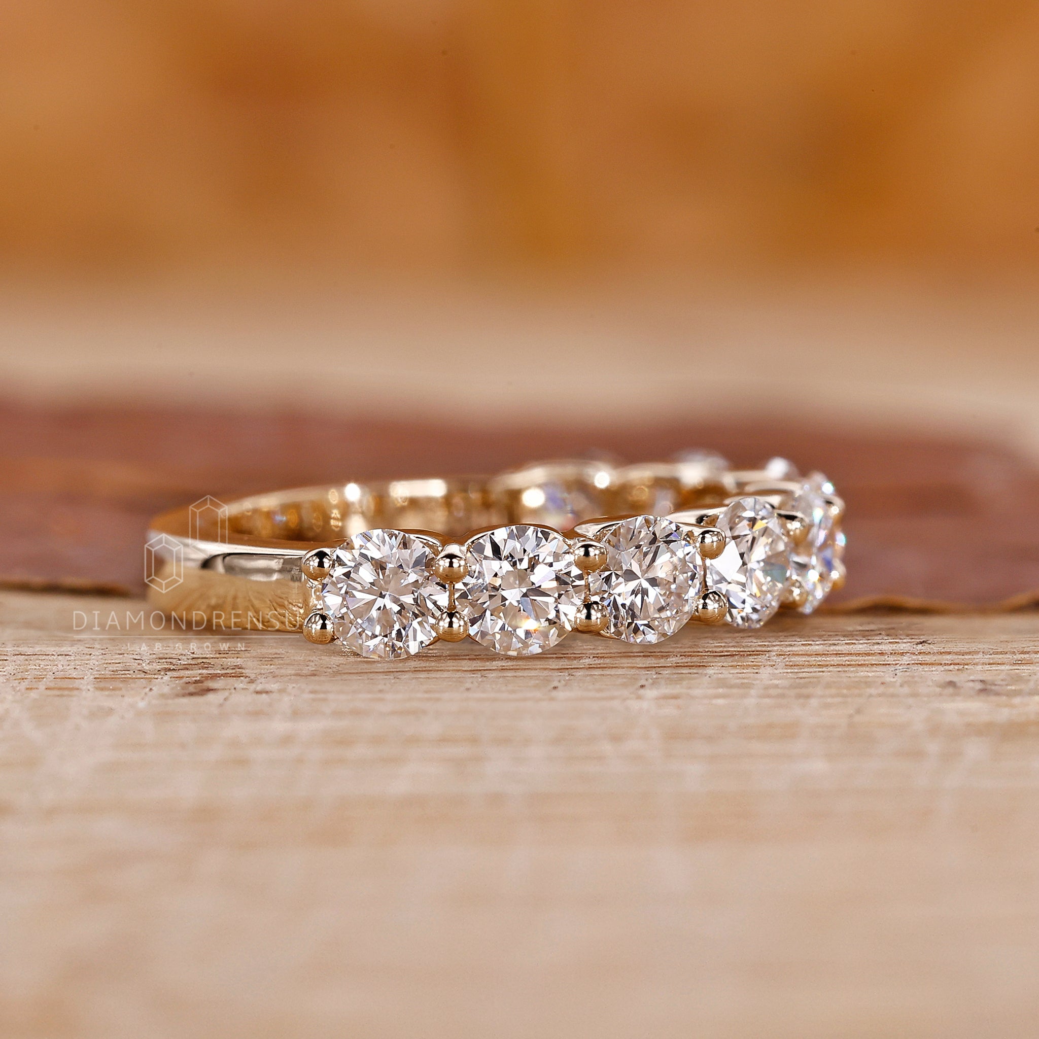 Yellow Gold Wedding Band in prong setting
