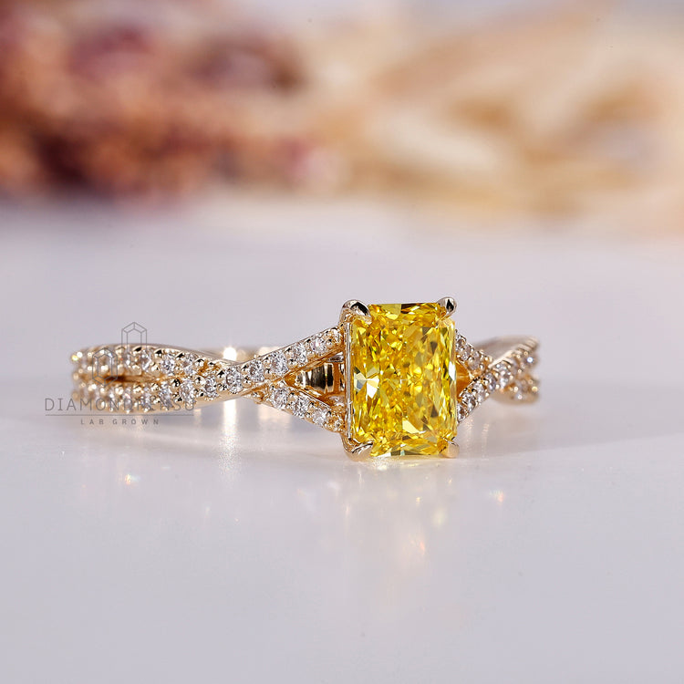 Yellow gold ring crafted with round diamond ring setting.
