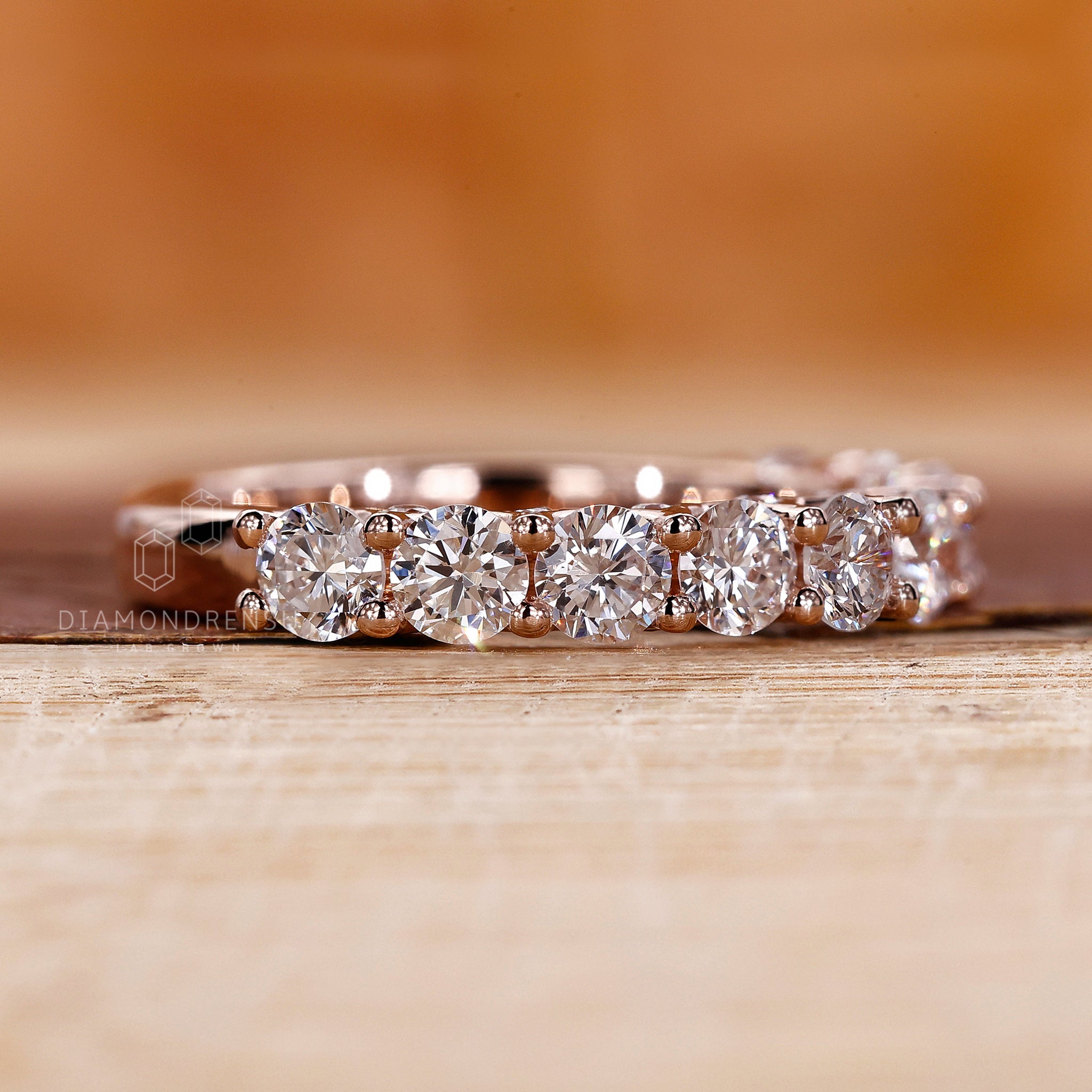 Round diamond wedding band in prong setting
