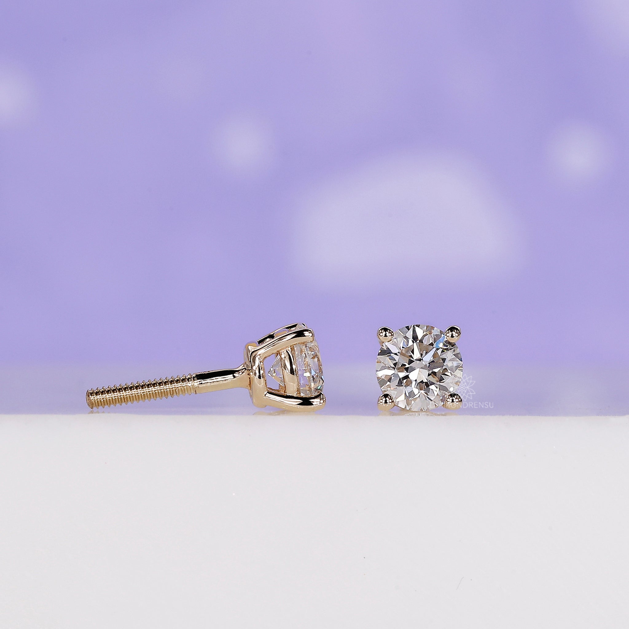 Buy earrings from Diamondrensu UK with custom round diamond design.