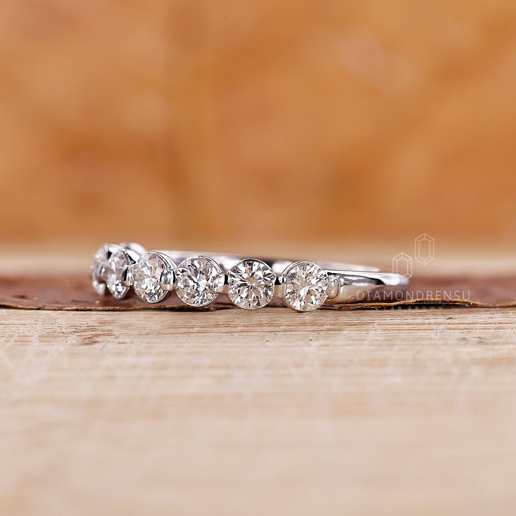 Prong Setting with white gold wedding band
