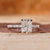 Cushion diamond engagement ring with hidden halo and four claw prong ring.
