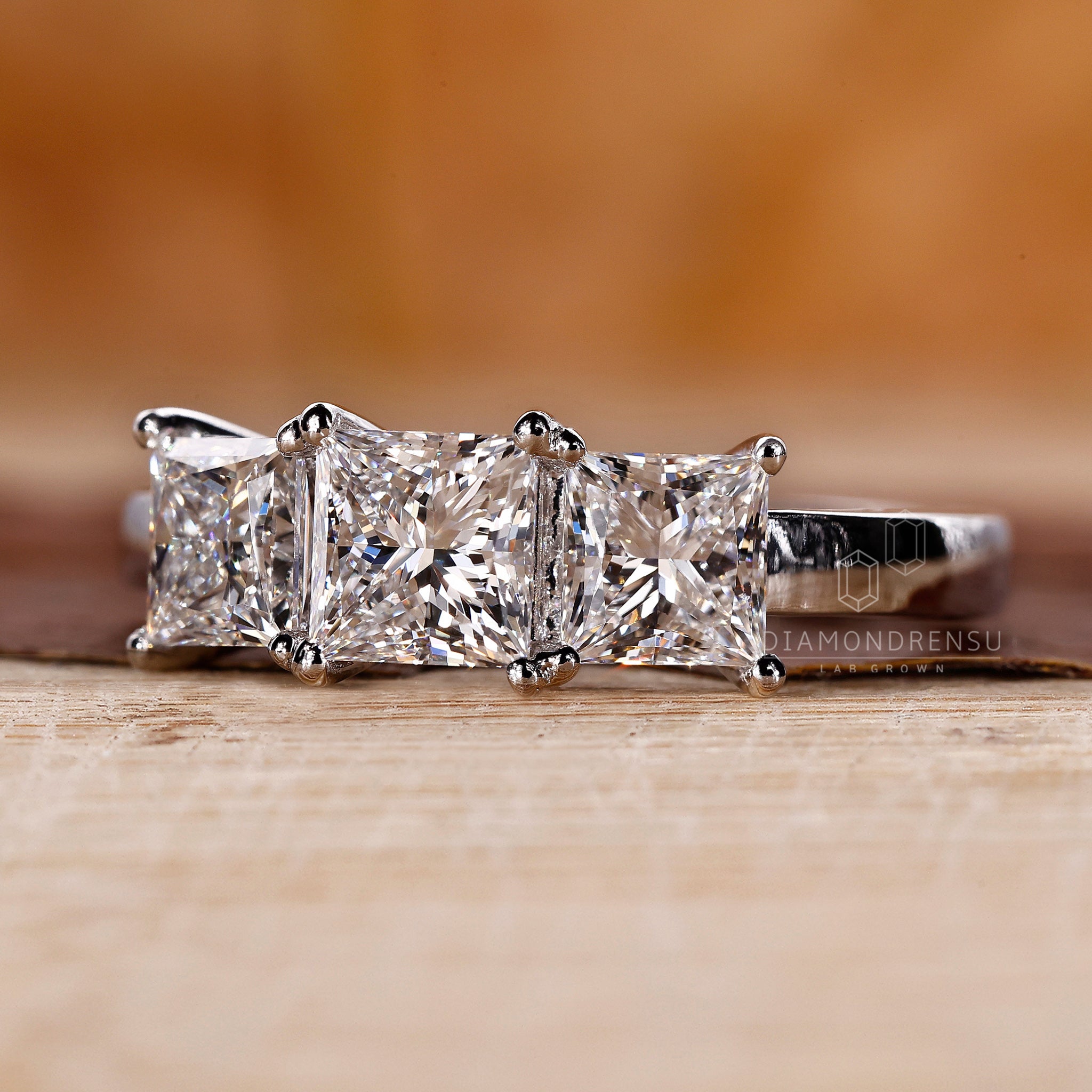 Buy engagement ring with princess cut centre and side stones
