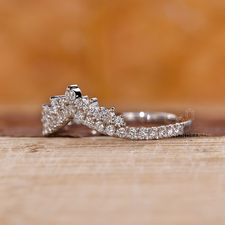 Crown-inspired diamond wedding band.
