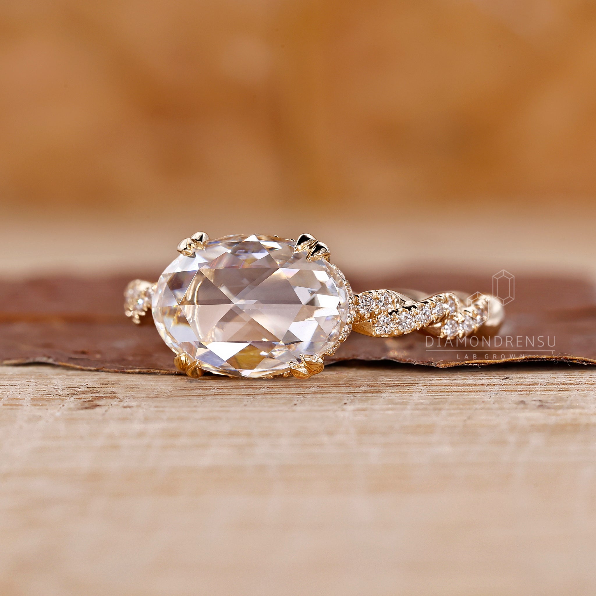Round cut engagement ring with double claw prong ring
