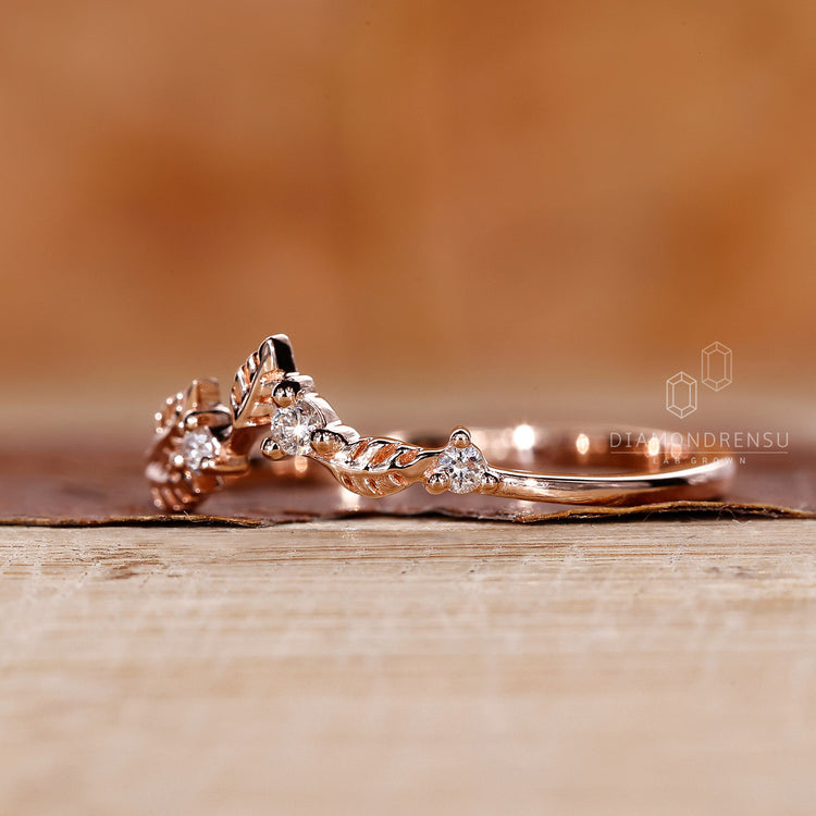 Rose gold chevron wedding band with diamonds.
