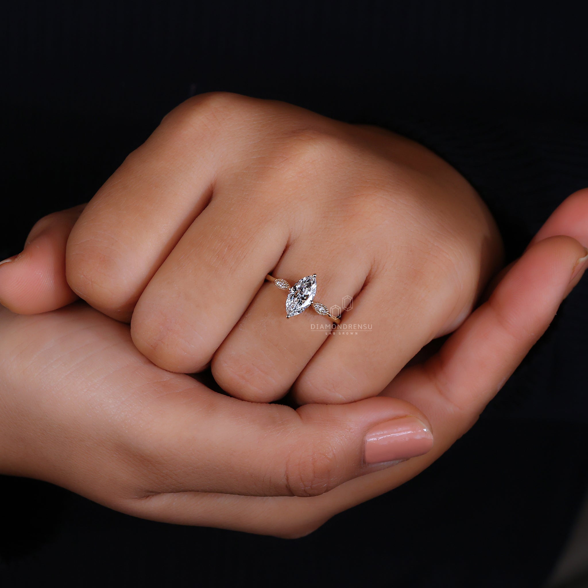 UK engagement ring with marquise outline.
