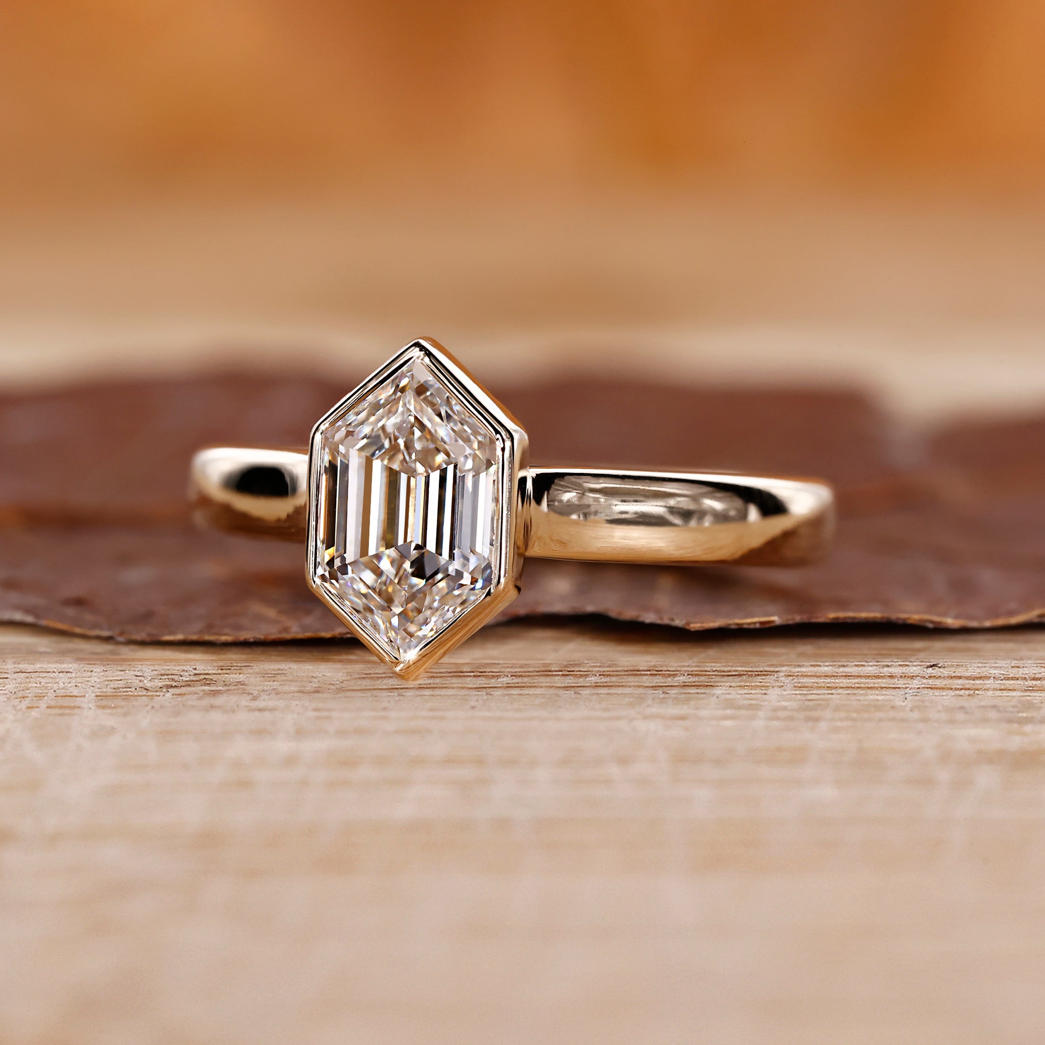 Buy diamond ring with bezel setting and clean lines.
