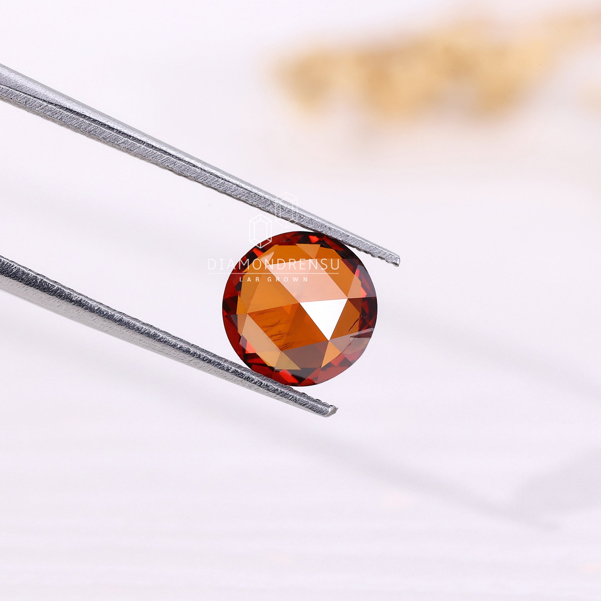 Loose round rose cut champagne lab diamond for sustainable jewellery.
