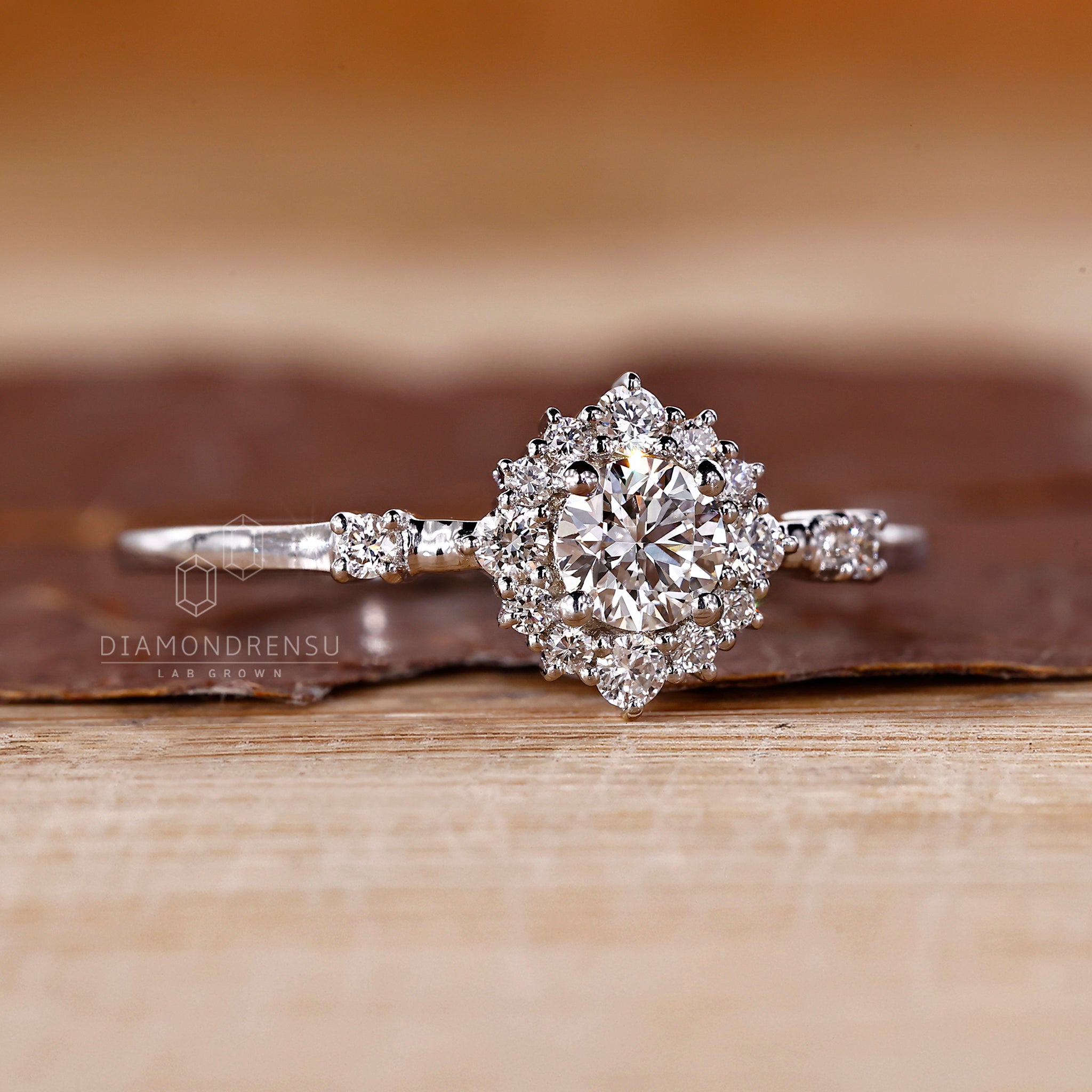 Diamond cluster ring with intricate detailing.

