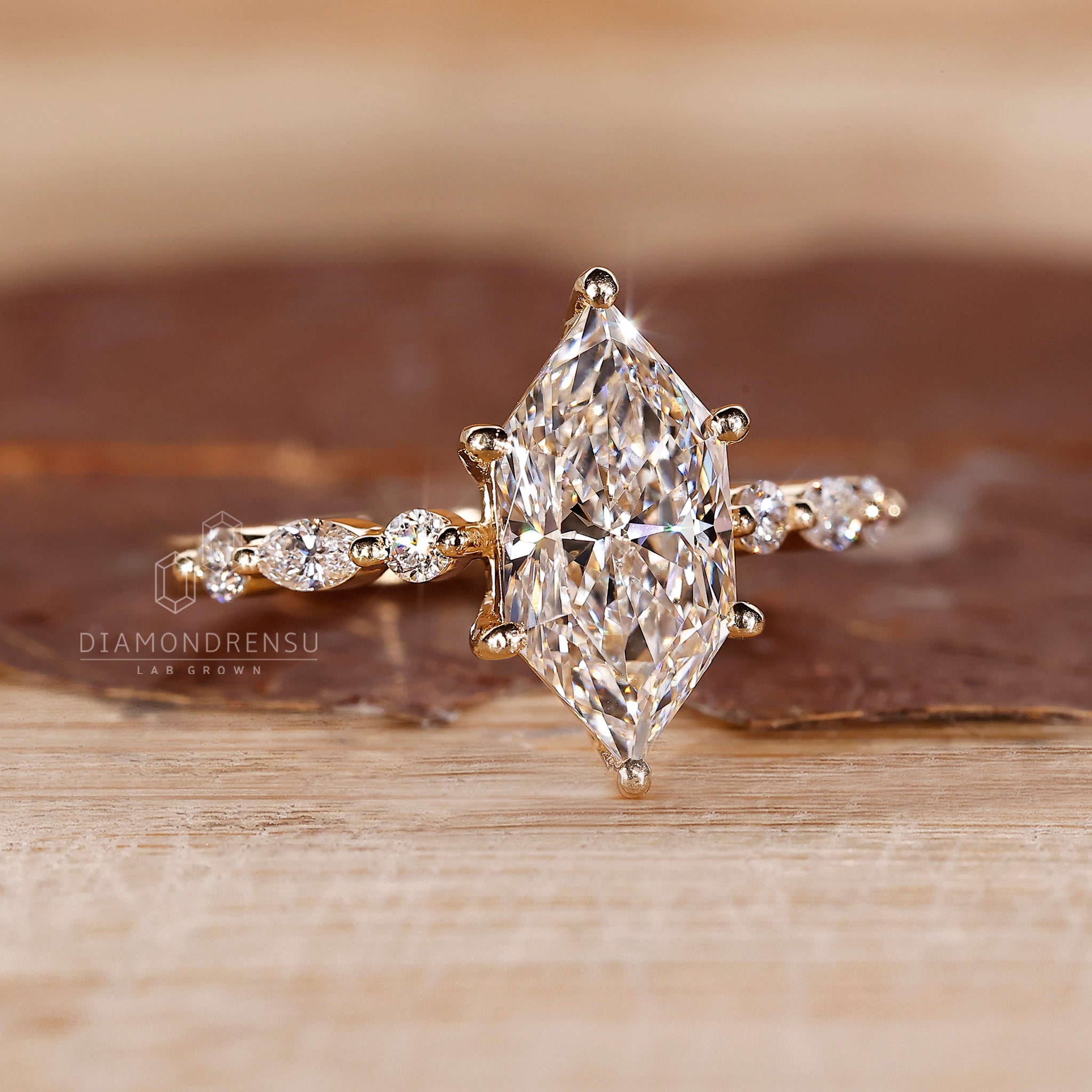 7 stone diamond ring with a Dutch Marquise center.
