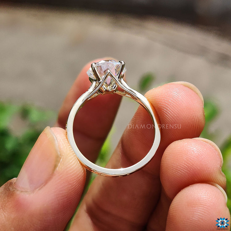 Custom moissanite engagement ring with octagon center.
