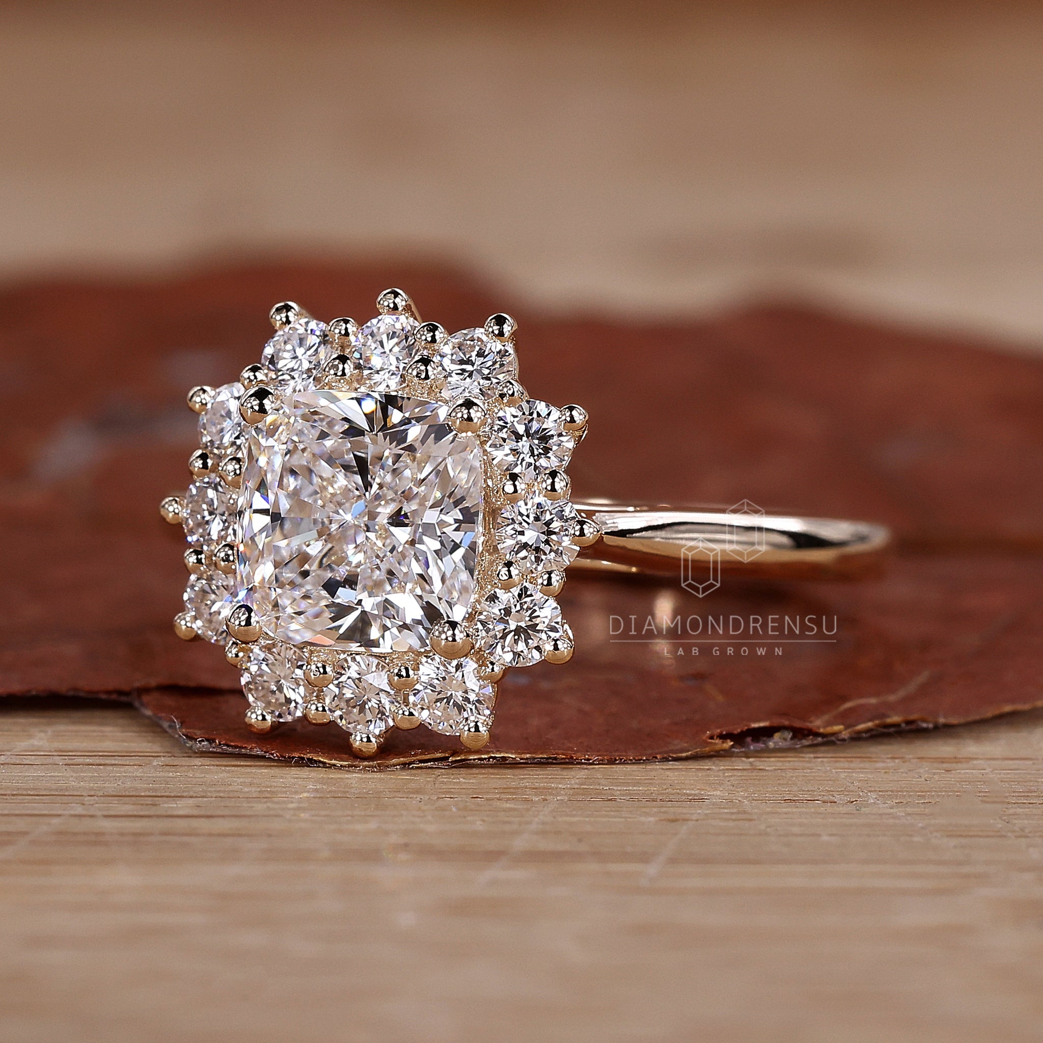 Cushion center diamond in halo setting.
