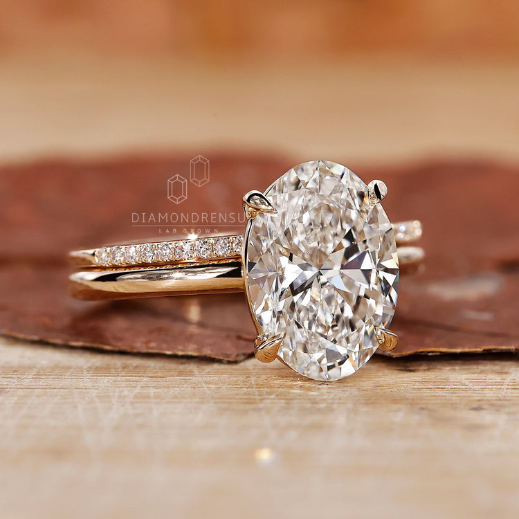 4 prong claw setting ring with half eternity wedding band.
