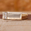 Mens signet ring crafted in yellow gold with two round Lab Grown Diamonds.
