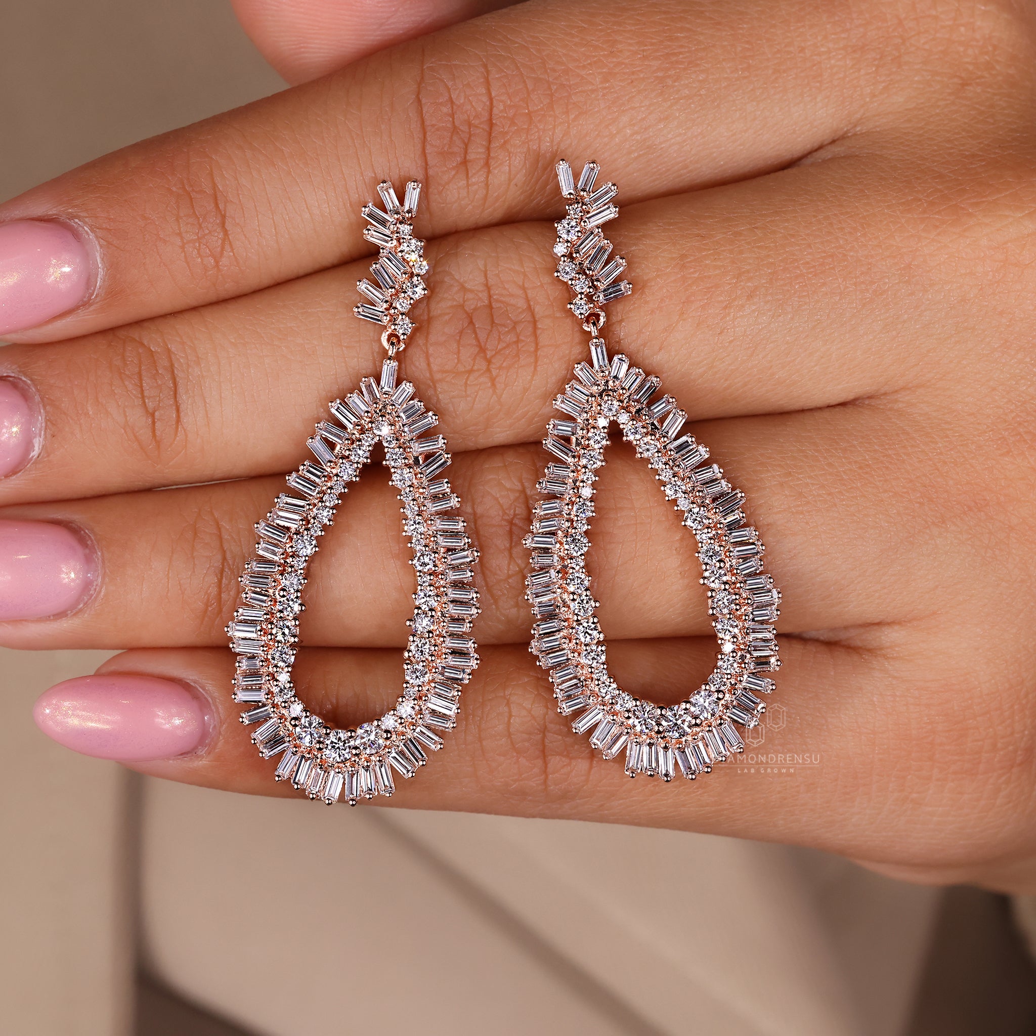 Custom earrings with baguette and round diamonds.
