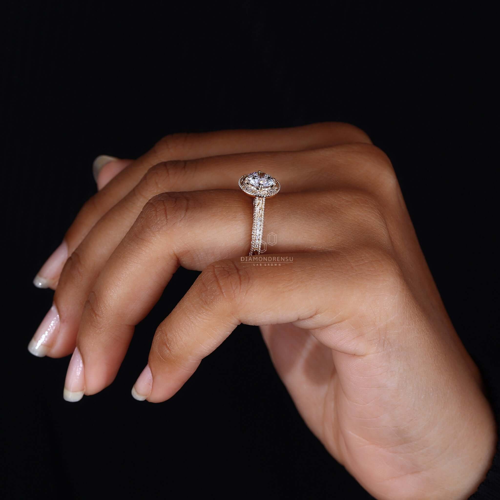 Unique halo design engagement ring crafted with IGI-certified Lab Grown Diamonds.