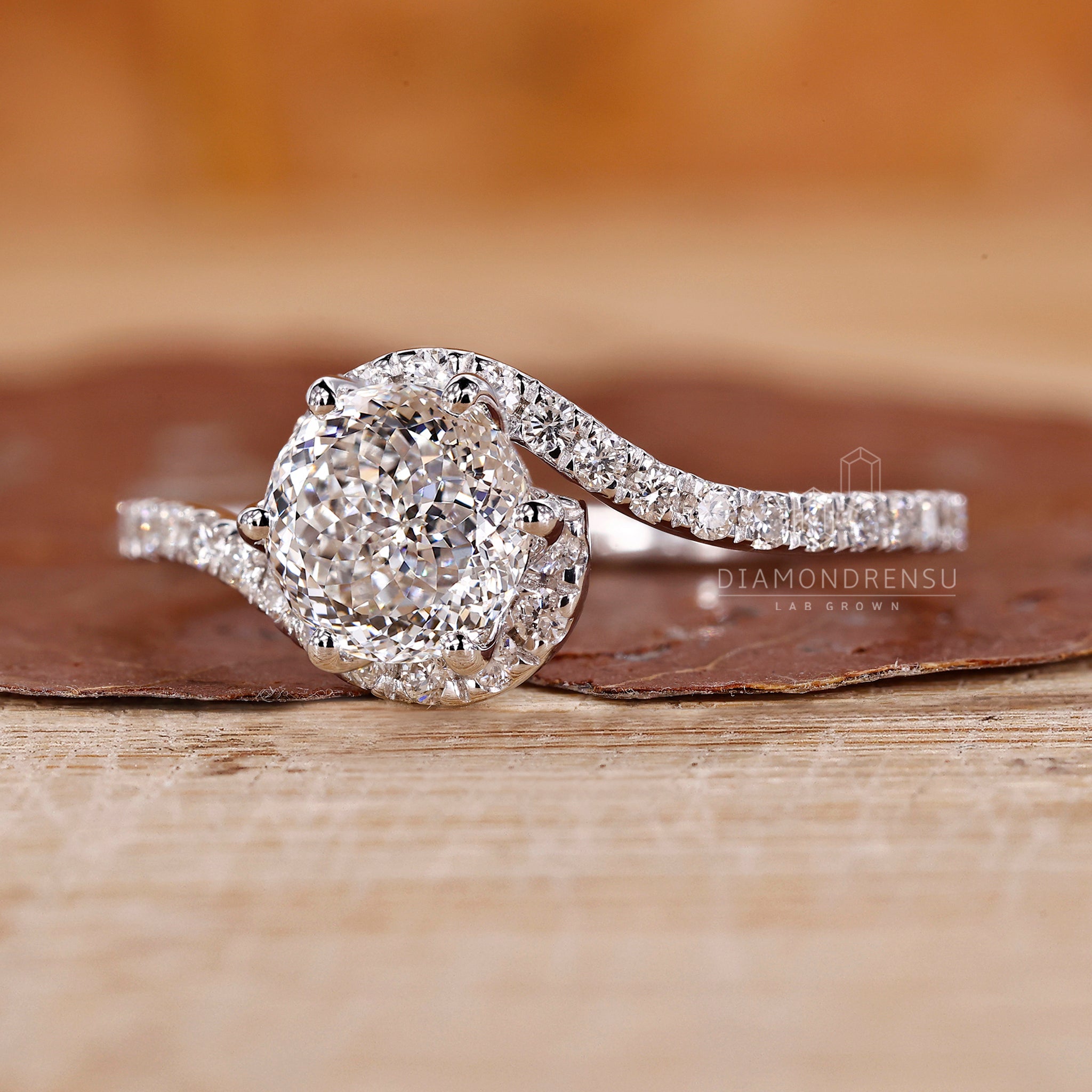 UK engagement ring includes Portuguese cut and halo style.
