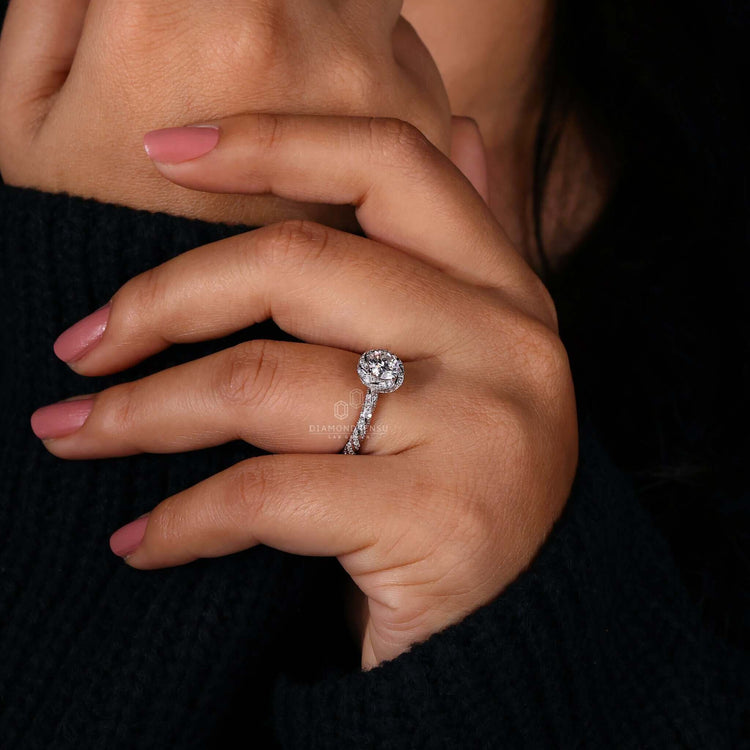 Sparkling halo diamond engagement ring for a timeless look.