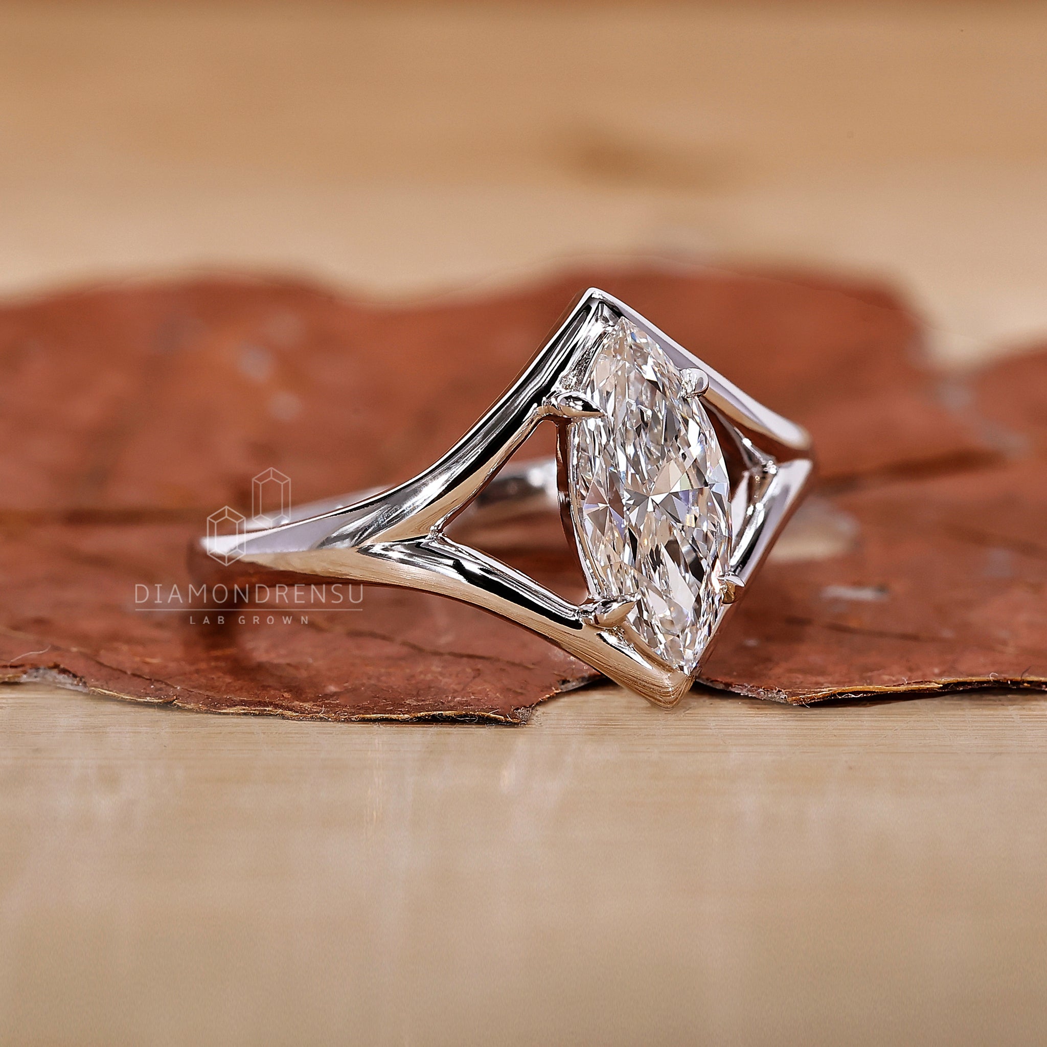 Diamond white gold ring styled as unique engagement ring.

