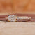 Radiant diamond ring with east to west radiant diamond in yellow gold.

