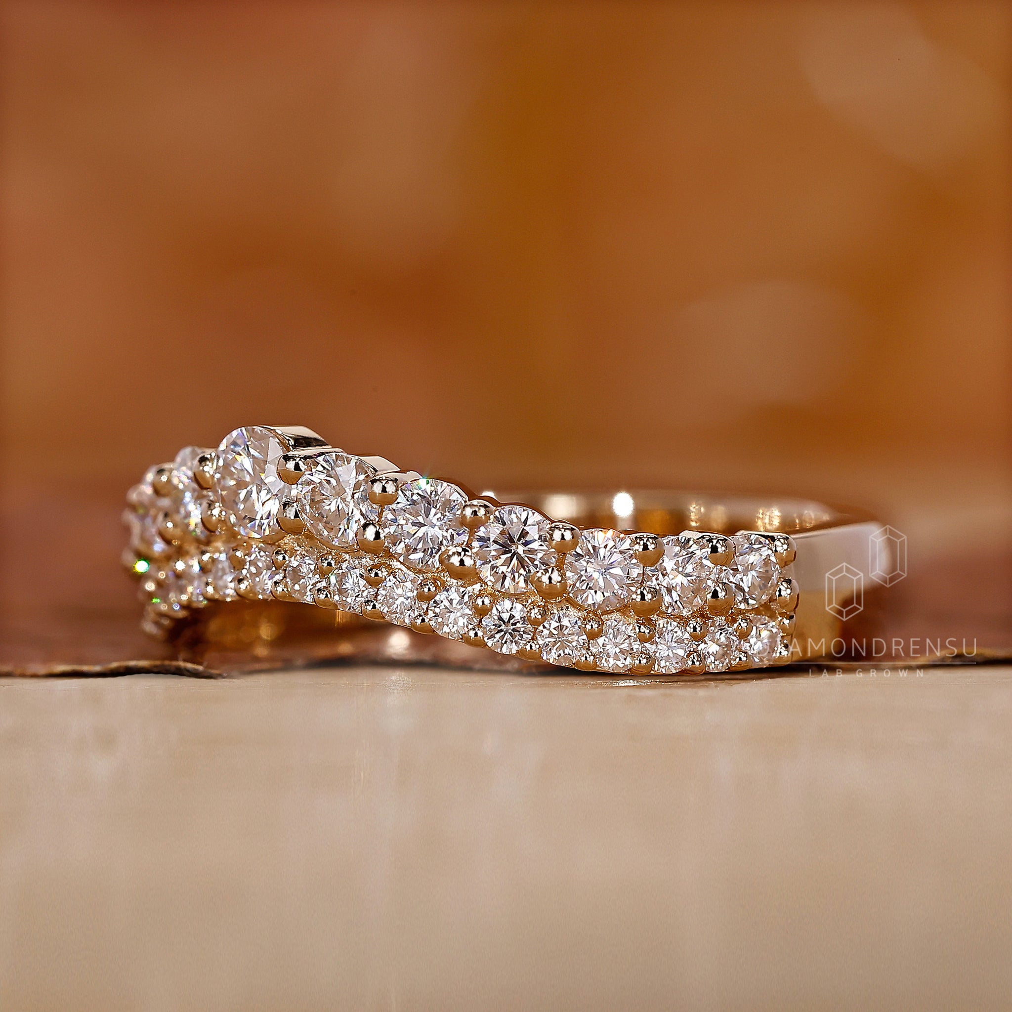 Diamondrensu UK yellow gold curved wedding band.
