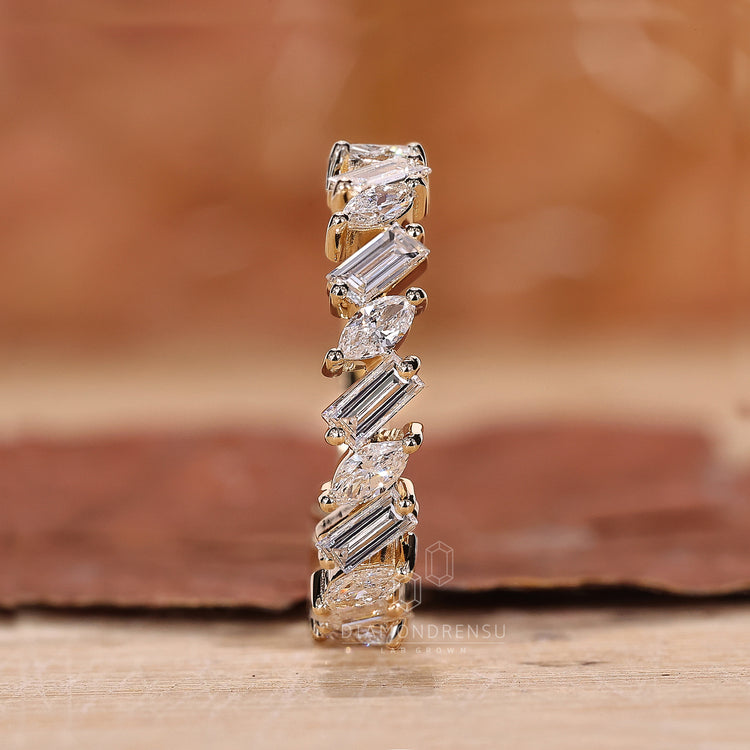 Lab diamond wedding ring with mixed shapes.
