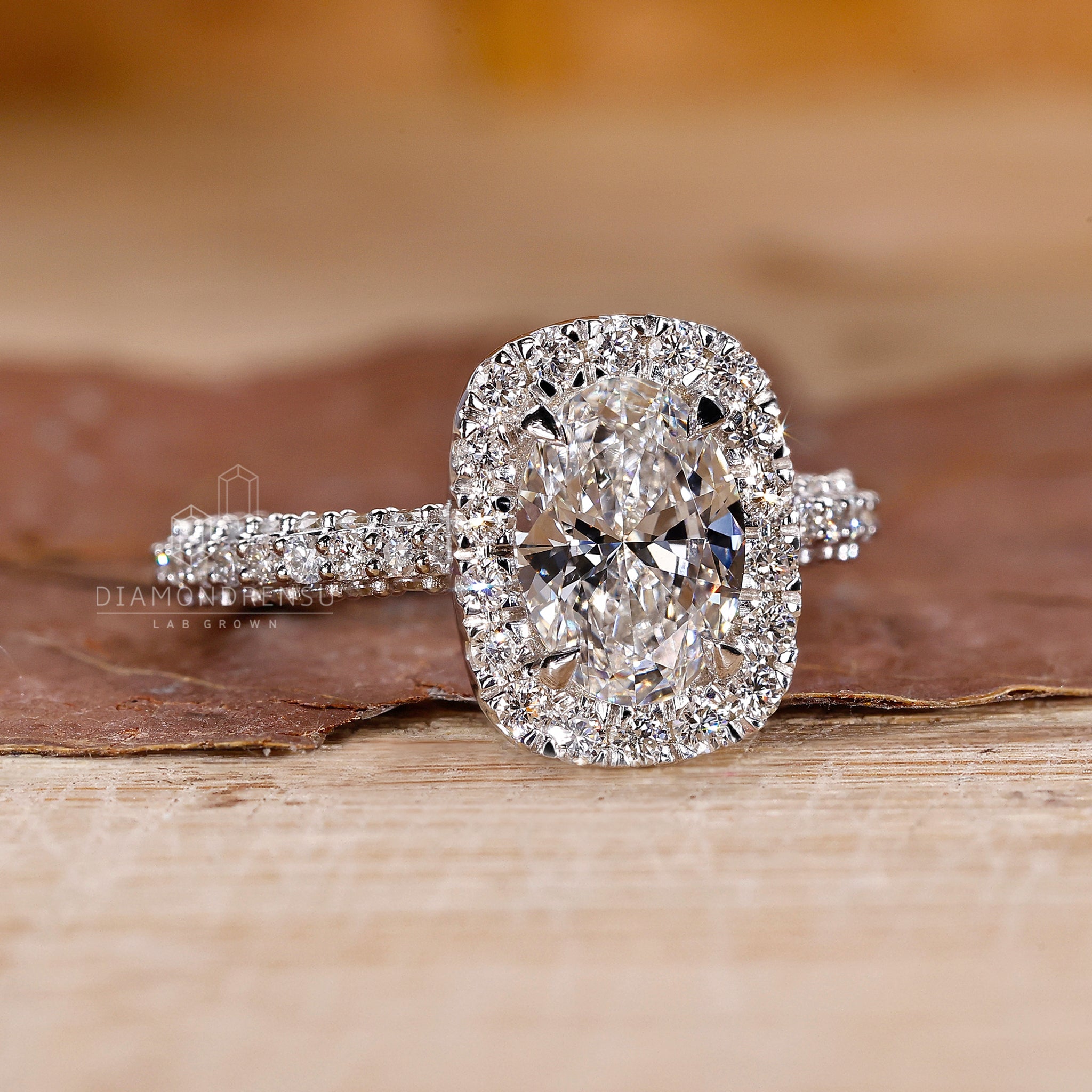 Diamondrensu UK engagement ring with lab diamond and hidden diamond accent.
