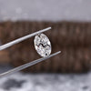 Loose oval diamond with 2.07 carat weight and IGI certification.

