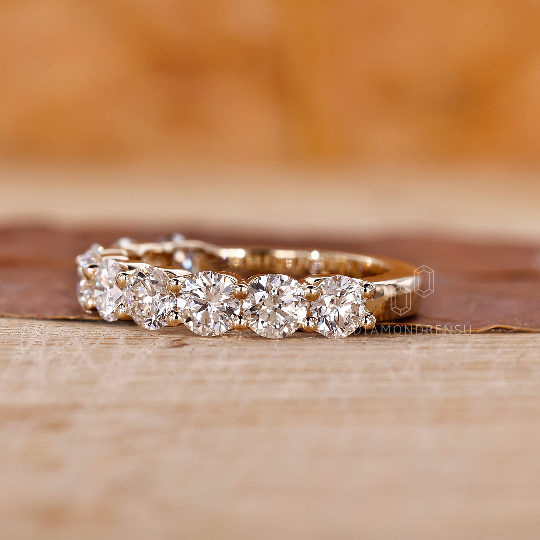 Round Diamond wedding band in half eternity style
