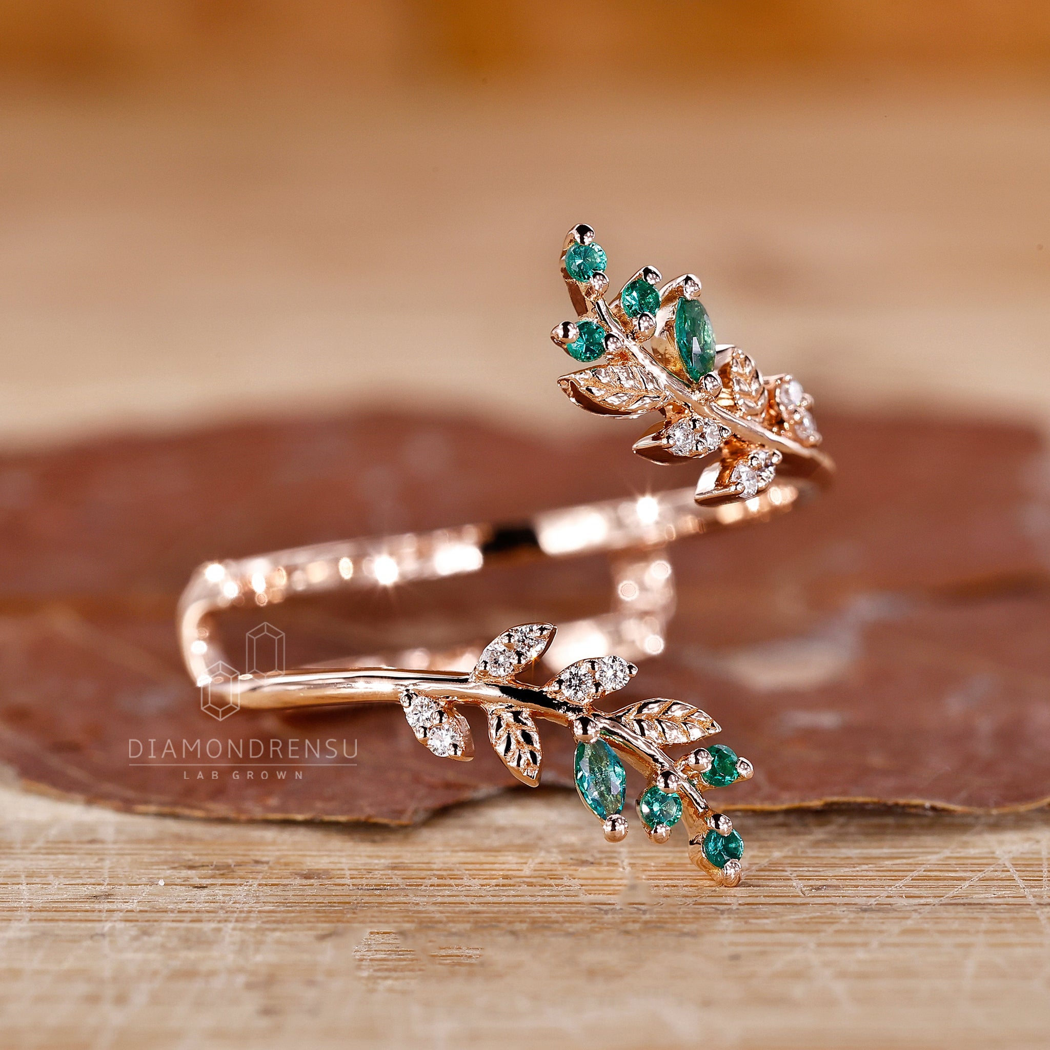Rose gold wedding band with handmade detailing and prong setting.