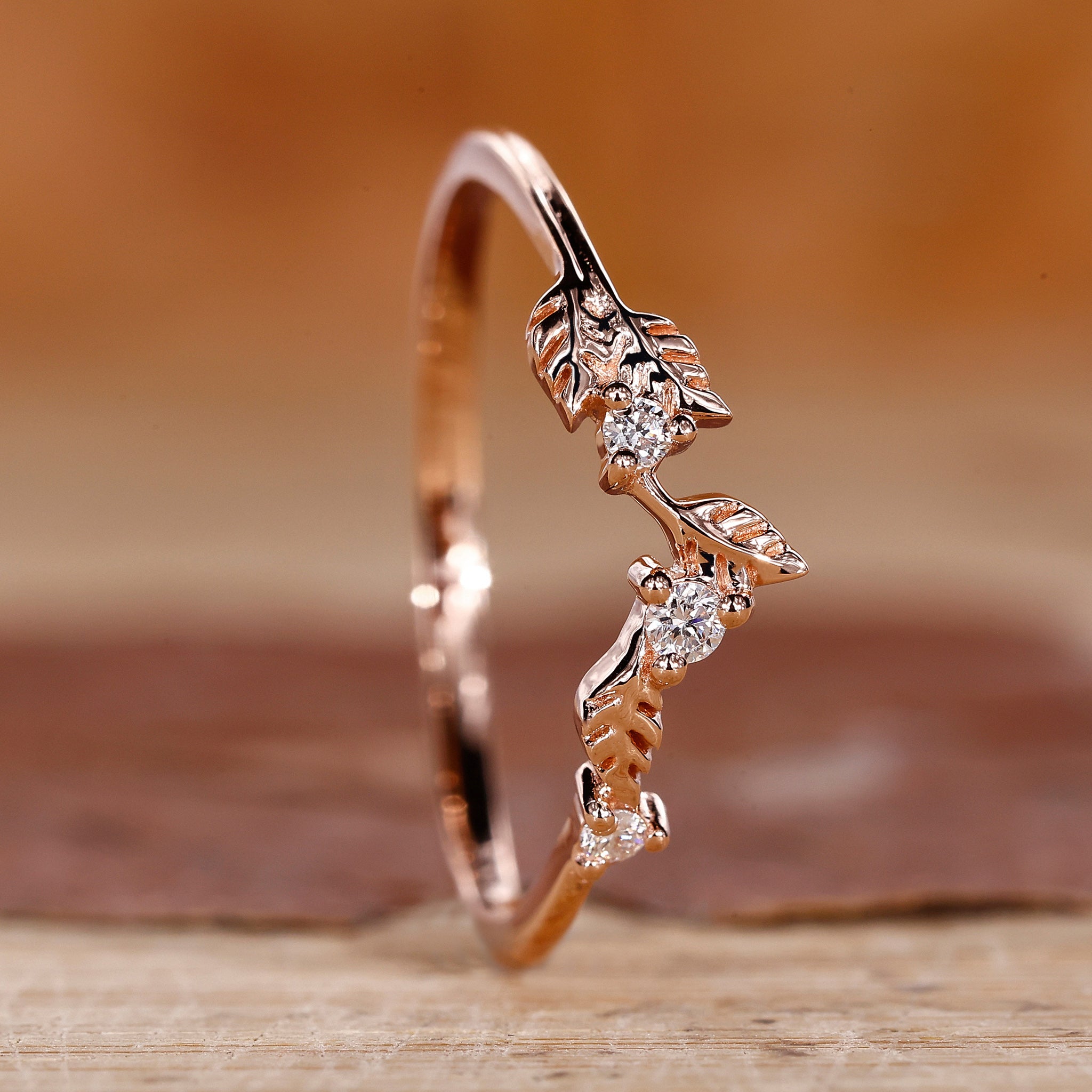 Leaf wedding band in rose gold.
