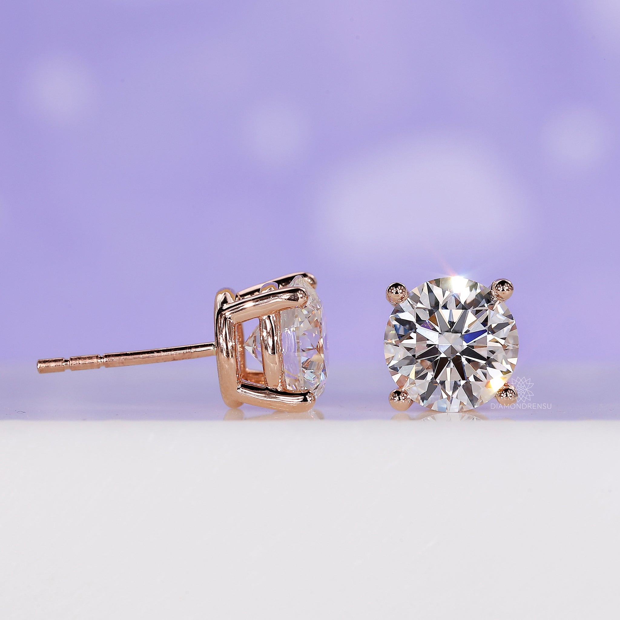 Handmade rose gold diamond earrings UK.