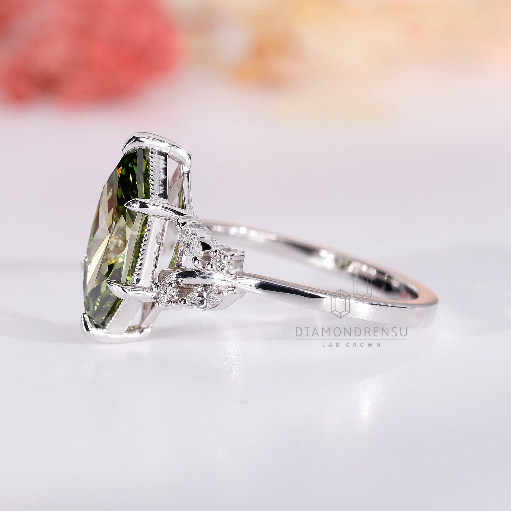 White gold ring with Dutch marquise diamond and marquise and round sidestones, IGI certified and lab grown