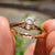 Yellow gold ring with octagon cut center stone.
