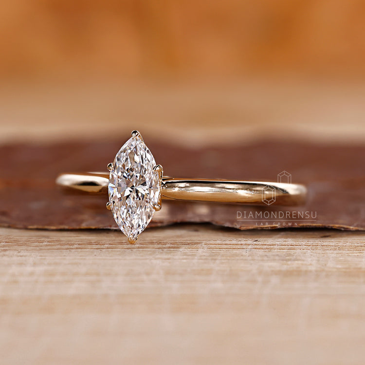 Tapered shank engagement ring with 6 prong claw setting.

