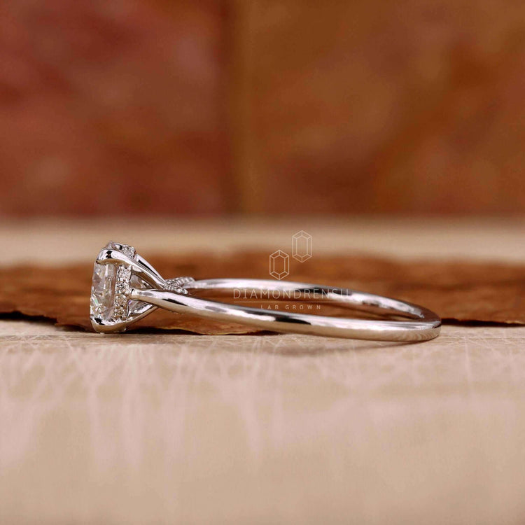 Dazzling hidden halo diamond ring for a timeless statement.