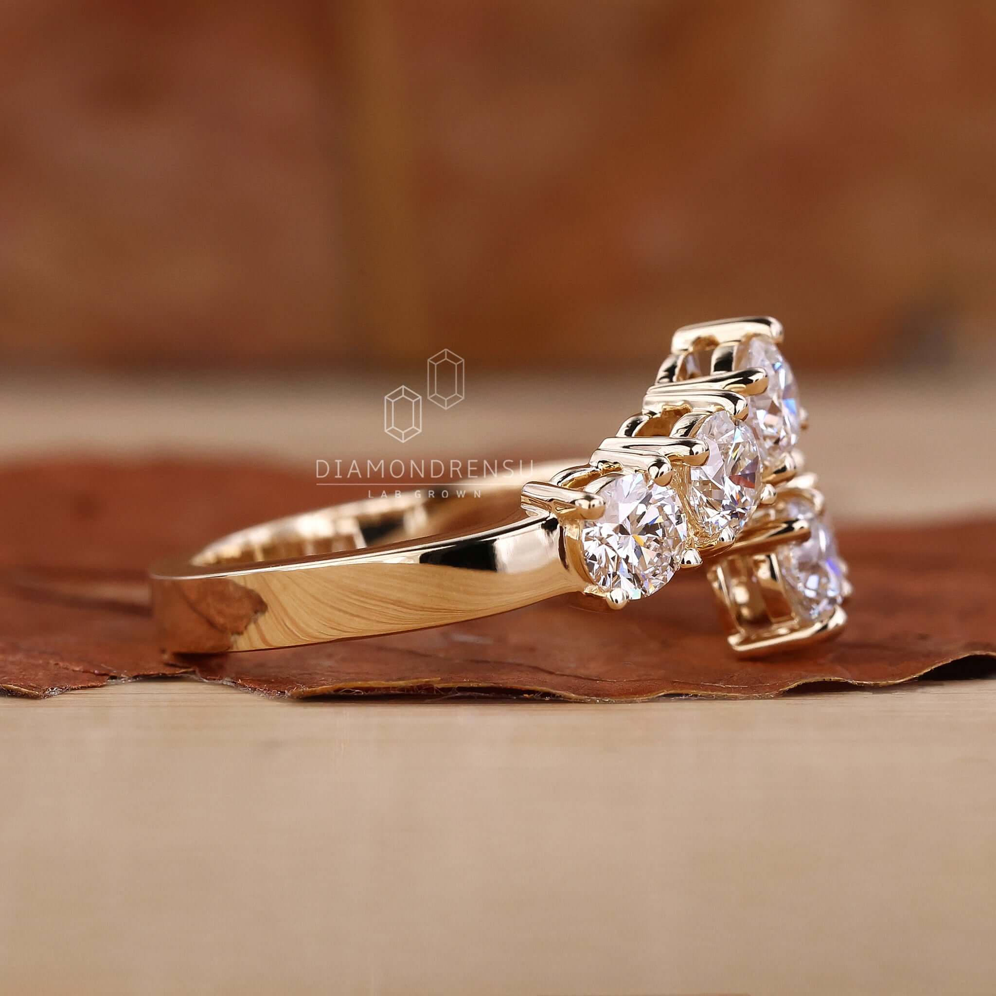 Bypass setting engagement ring crafted to enhance the beauty of the diamond with a unique twist.