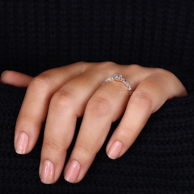 Pave band ring with oval center diamond.
