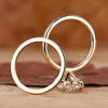 Half eternity wedding band with lab grown diamond and oval engagement ring.
