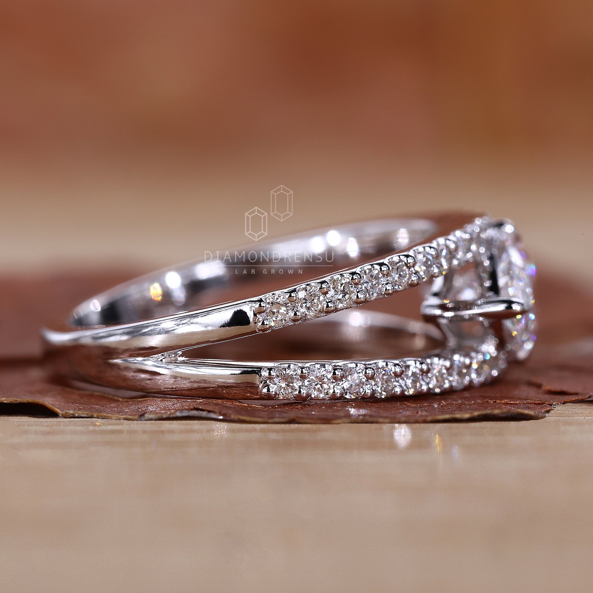 White gold engagement ring with marquise shape.

