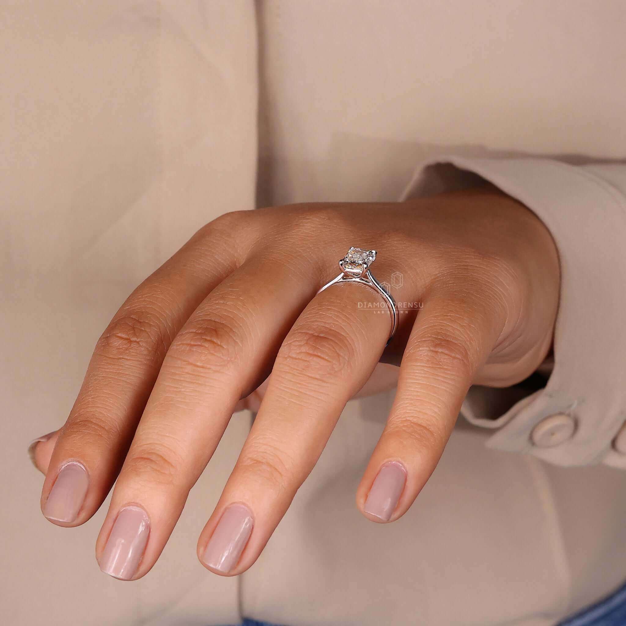 Unique claw prong engagement ring featuring lab grown diamonds.