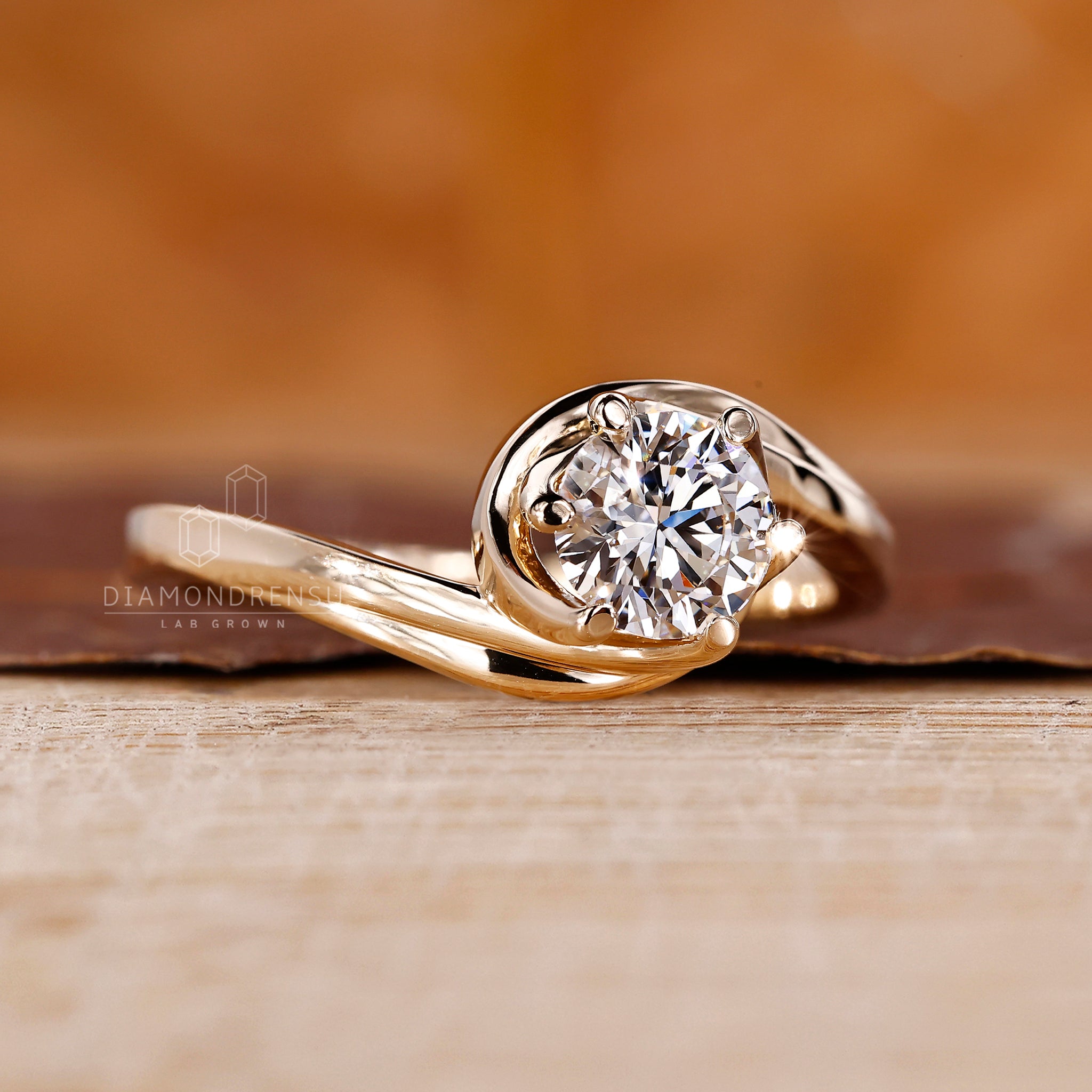 Yellow gold solitaire ring with clean prong setting.
