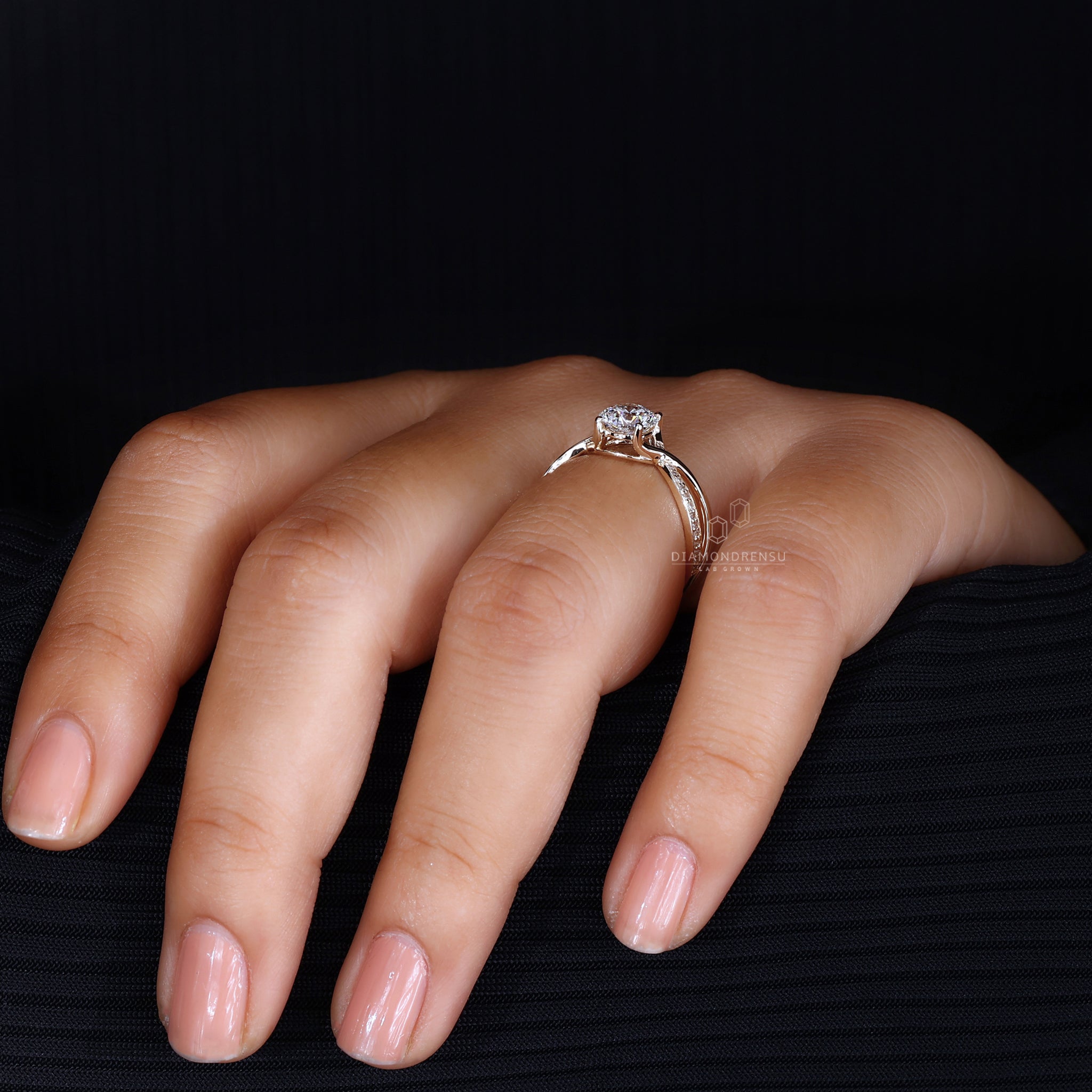 Round cut pave band engagement ring.

