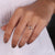 Solitaire diamond ring in yellow gold with hidden heart setting design.
