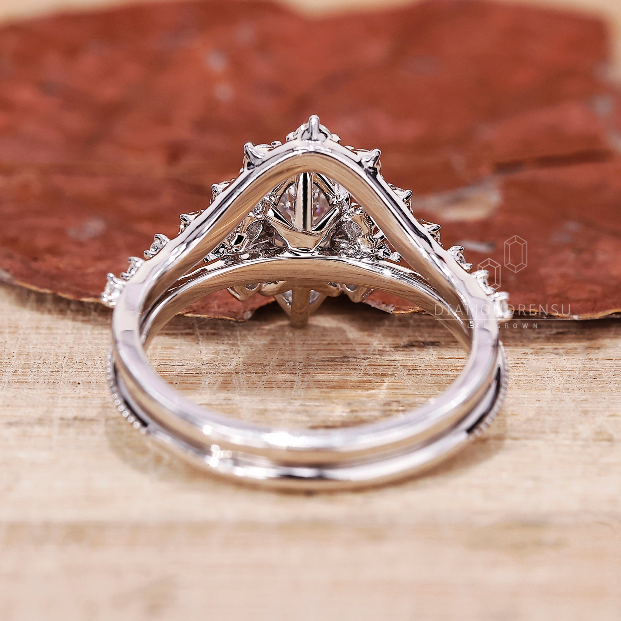 Tiara diamond band with round diamond wedding band in white gold.
