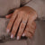 4 claw prong setting oval diamond ring.
